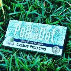 The Polkadot Creamy Pistachio Belgian Chocolate is a delectable treat that blends the rich flavors of Belgian chocolate with the nutty taste of pistachios